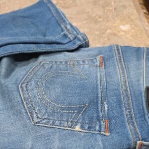Blue Denim Jeans with Signature Stitching